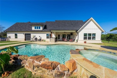 This beautifully designed home offers a private entrance to the on Cedar Creek Country Club in Texas - for sale on GolfHomes.com, golf home, golf lot