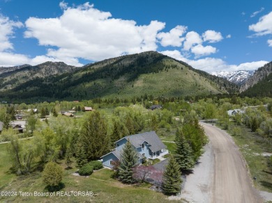 Step into a meticulously maintained interior boasting 4 bedrooms on Cedar Creek Golf Course in Wyoming - for sale on GolfHomes.com, golf home, golf lot