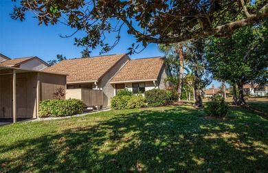 Welcome to Bird Bay Village, a fabulous resort-style condominium on Bird Bay Executive Golf Club in Florida - for sale on GolfHomes.com, golf home, golf lot