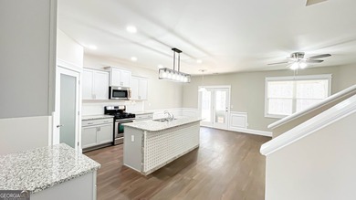 Welcome to this beautifully updated 5-bedroom, 3-bath on Canongate At Heron Bay in Georgia - for sale on GolfHomes.com, golf home, golf lot