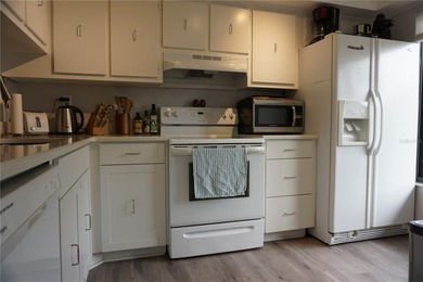 Beautifully furnished ground floor 2 bed / 2 bath Condo located on Isla Del Sol Yacht and Country Club in Florida - for sale on GolfHomes.com, golf home, golf lot