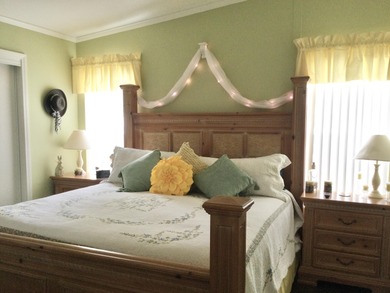 Meticulously maintained  home situated at the end of a quiet on Spanish Lakes I in Florida - for sale on GolfHomes.com, golf home, golf lot