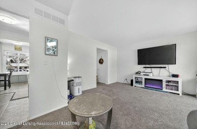 Welcome to 1985 Lac Du Mont, located in the city of Haslett MI on  in Michigan - for sale on GolfHomes.com, golf home, golf lot