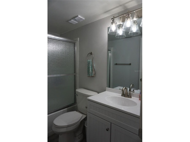 Beautifully furnished ground floor 2 bed / 2 bath Condo located on Isla Del Sol Yacht and Country Club in Florida - for sale on GolfHomes.com, golf home, golf lot