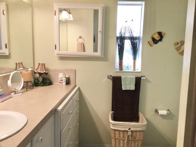 Meticulously maintained  home situated at the end of a quiet on Spanish Lakes I in Florida - for sale on GolfHomes.com, golf home, golf lot