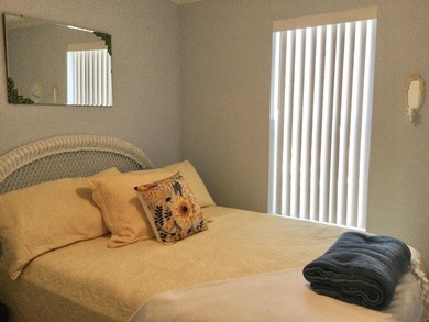 Meticulously maintained home situated at the end of a quiet on Spanish Lakes I in Florida - for sale on GolfHomes.com, golf home, golf lot