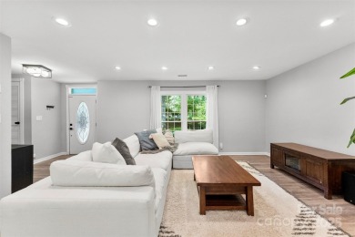 Welcome home to this beautifully updated gem in the heart of the on Raintree Country Club in North Carolina - for sale on GolfHomes.com, golf home, golf lot