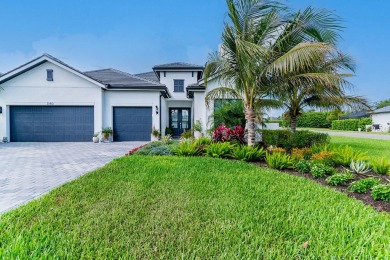 This stunning home boasts contemporary, elegant designer on The Golf Club At Fiddlers Creek in Florida - for sale on GolfHomes.com, golf home, golf lot