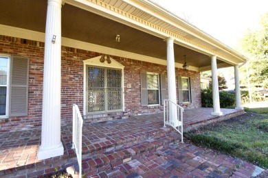 This elegant home in Stonebrook overlooks the Helena Country on Helena Country Club in Arkansas - for sale on GolfHomes.com, golf home, golf lot