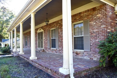 This elegant home in Stonebrook overlooks the Helena Country on Helena Country Club in Arkansas - for sale on GolfHomes.com, golf home, golf lot