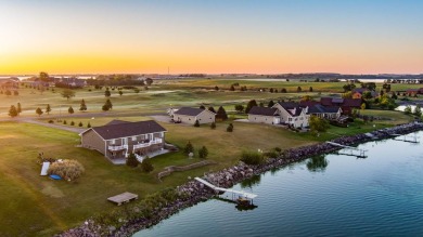 Live at the lake year-round and enjoy all that the Lake Albert on Lake Region Golf Course in South Dakota - for sale on GolfHomes.com, golf home, golf lot