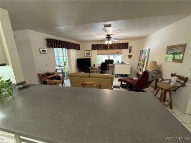 Spacious and inviting, this home is perfectly situated on the on Citrus Springs Country Club in Florida - for sale on GolfHomes.com, golf home, golf lot