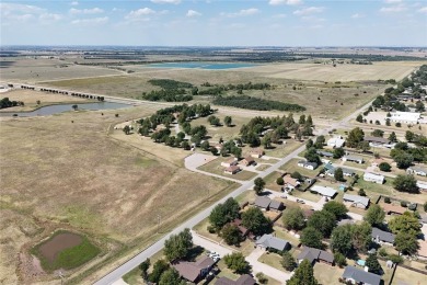 Discover the perfect practicality in this exquisite home located on Crimson Creek Golf Club in Oklahoma - for sale on GolfHomes.com, golf home, golf lot