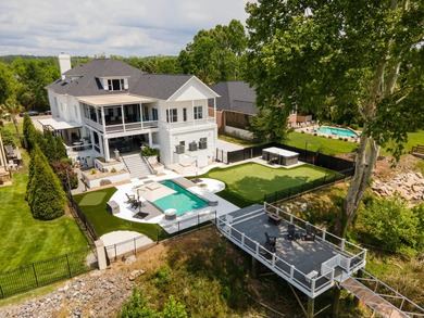 Welcome to The River Estate - a truly one-of-a-kind, 7-bedroom on The River Golf Club in South Carolina - for sale on GolfHomes.com, golf home, golf lot