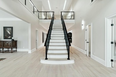 Welcome to The River Estate - a truly one-of-a-kind, 7-bedroom on The River Golf Club in South Carolina - for sale on GolfHomes.com, golf home, golf lot