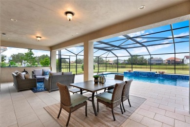 Nestled in the Eagle Creek golf community, this exquisite on Eagle Creek Golf Club in Florida - for sale on GolfHomes.com, golf home, golf lot