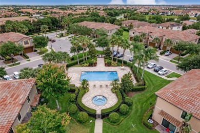 Nestled in the Eagle Creek golf community, this exquisite on Eagle Creek Golf Club in Florida - for sale on GolfHomes.com, golf home, golf lot