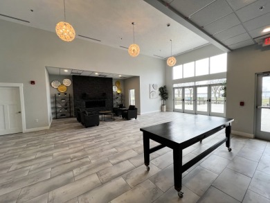 Condo with Golf Course View on Sunrise Pointe Golf Course in Iowa - for sale on GolfHomes.com, golf home, golf lot