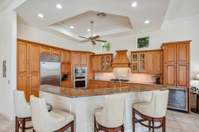 Discover breathtaking expansive golf course and lake views from on The Rookery At Marco in Florida - for sale on GolfHomes.com, golf home, golf lot