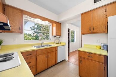 Step back in time and fall in love with this vintage Dunedin on The Dunedin Country Club in Florida - for sale on GolfHomes.com, golf home, golf lot