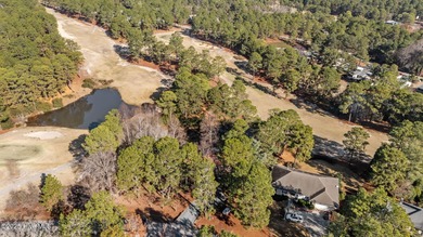 Whispering Pines Charmer with fabulous pond and golf views!! on Whispering Pines Golf Course in North Carolina - for sale on GolfHomes.com, golf home, golf lot