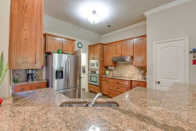 PRISTINE PECAN PLANTATION HOME offers curb appeal, charm, and on Nutcracker Golf Club in Texas - for sale on GolfHomes.com, golf home, golf lot