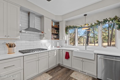 Whispering Pines Charmer with fabulous pond and golf views!! on Whispering Pines Golf Course in North Carolina - for sale on GolfHomes.com, golf home, golf lot