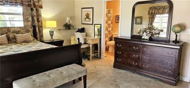 Furnished 1 bedroom-1.5 bath condo. 18* diagonal tile throughout on The American Golf Club in Florida - for sale on GolfHomes.com, golf home, golf lot