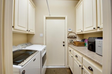 PRISTINE PECAN PLANTATION HOME offers curb appeal, charm, and on Nutcracker Golf Club in Texas - for sale on GolfHomes.com, golf home, golf lot