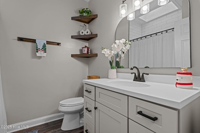 Whispering Pines Charmer with fabulous pond and golf views!! on Whispering Pines Golf Course in North Carolina - for sale on GolfHomes.com, golf home, golf lot