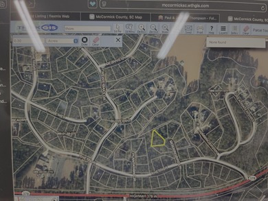 Enjoy this sloped lot perfect for a walk out basement. Close to on Monticello Golf Club At Savannah Lakes in South Carolina - for sale on GolfHomes.com, golf home, golf lot