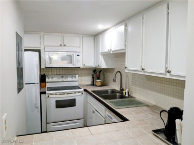 This beautifully designed townhouse, located in a vibrant 55+ on Lehigh Resort Club in Florida - for sale on GolfHomes.com, golf home, golf lot