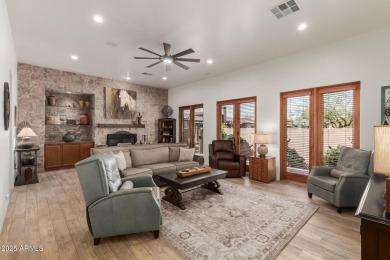 This stunning model home in the exclusive Superstition Golf & on Superstition Mountain Club - Lost Gold in Arizona - for sale on GolfHomes.com, golf home, golf lot