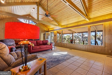 Discover this beautifully preserved mid-century lake house on Francis Lake Golf Club in Georgia - for sale on GolfHomes.com, golf home, golf lot