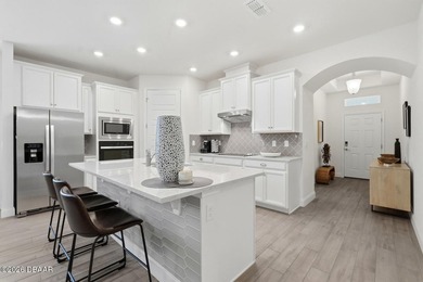 Welcome to this beautifully designed 3-bedroom, 3-bathroom home on Halifax Plantation Golf Club in Florida - for sale on GolfHomes.com, golf home, golf lot