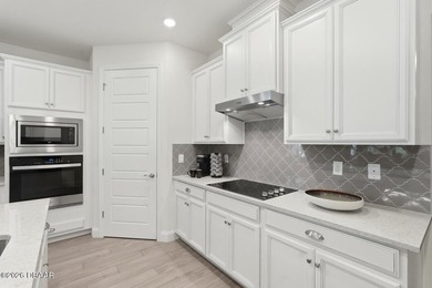 Welcome to this beautifully designed 3-bedroom, 3-bathroom home on Halifax Plantation Golf Club in Florida - for sale on GolfHomes.com, golf home, golf lot