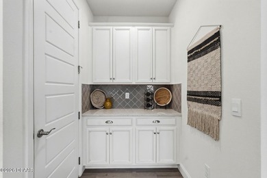 Welcome to this beautifully designed 3-bedroom, 3-bathroom home on Halifax Plantation Golf Club in Florida - for sale on GolfHomes.com, golf home, golf lot