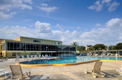 Discover refined elegance in this spacious, sophisticated top on On Top Of The World Golf Course in Florida - for sale on GolfHomes.com, golf home, golf lot