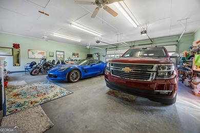 Discover this beautifully preserved mid-century lake house on Francis Lake Golf Club in Georgia - for sale on GolfHomes.com, golf home, golf lot