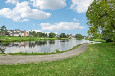 Stunning golf course, pond, and bridge views surround this on Bushwood Golf Club in Michigan - for sale on GolfHomes.com, golf home, golf lot