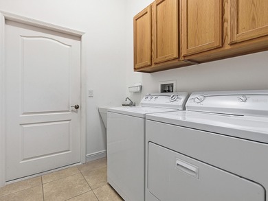 Imagine unwinding in a stunning  St. Simons model within a on Nancy Lopez Legacy Golf and Country Club in Florida - for sale on GolfHomes.com, golf home, golf lot