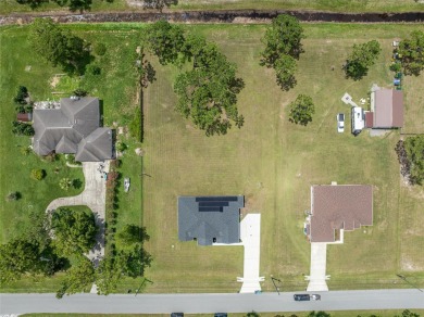 Under contract-accepting backup offers. Beautiful home built in on Wedgefield Golf Club in Florida - for sale on GolfHomes.com, golf home, golf lot