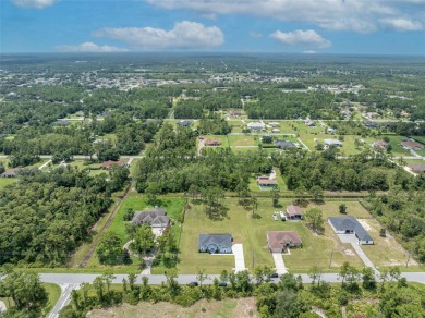 Under contract-accepting backup offers. Beautiful home built in on Wedgefield Golf Club in Florida - for sale on GolfHomes.com, golf home, golf lot