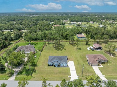 Under contract-accepting backup offers. Beautiful home built in on Wedgefield Golf Club in Florida - for sale on GolfHomes.com, golf home, golf lot