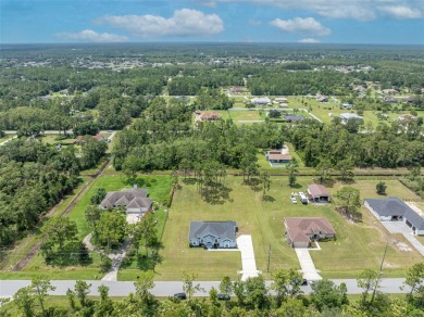 Under contract-accepting backup offers. Beautiful home built in on Wedgefield Golf Club in Florida - for sale on GolfHomes.com, golf home, golf lot