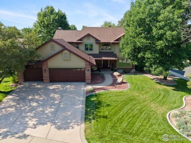 Elegantly positioned on a spacious corner lot in coveted Paragon on Southridge Golf Club in Colorado - for sale on GolfHomes.com, golf home, golf lot