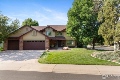 Elegantly positioned on a spacious corner lot in coveted Paragon on Southridge Golf Club in Colorado - for sale on GolfHomes.com, golf home, golf lot