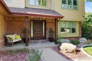 Elegantly positioned on a spacious corner lot in coveted Paragon on Southridge Golf Club in Colorado - for sale on GolfHomes.com, golf home, golf lot