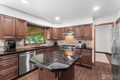 Elegantly positioned on a spacious corner lot in coveted Paragon on Southridge Golf Club in Colorado - for sale on GolfHomes.com, golf home, golf lot