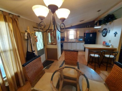This home has great 'bones' with lots of potential for the right on Lakes at Leesburg Golf Course in Florida - for sale on GolfHomes.com, golf home, golf lot